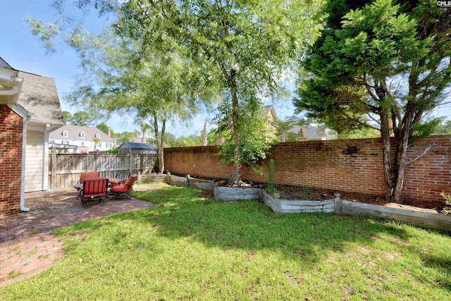 400 Mallet Hill Rd Unit B1, Columbia, SC 29223 - fenced backyard featuring a patio area and a vegetable garden