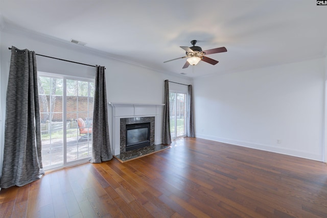400 Mallet Hill Rd Unit B1, Columbia, SC 29223 - unfurnished living room with wood finished floors, ceiling fan, a premium fireplace, and ornamental molding