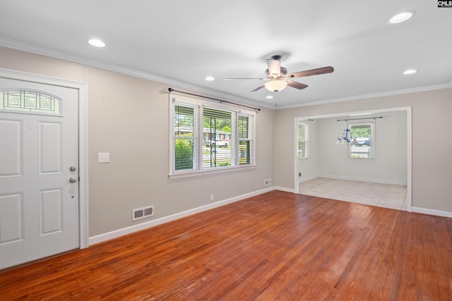 811 Rosedale Rd, West Columbia, SC 29170 - entryway featuring ceiling fan, light wood-style floors, crown molding, recessed lighting, and a chandelier