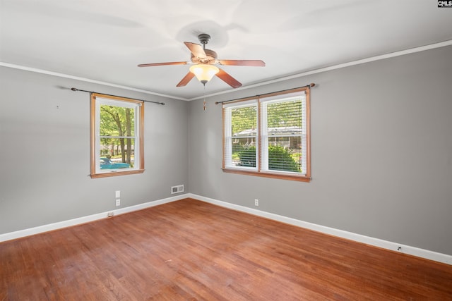 811 Rosedale Rd, West Columbia, SC 29170 - spare room with ornamental molding, wood finished floors, and ceiling fan