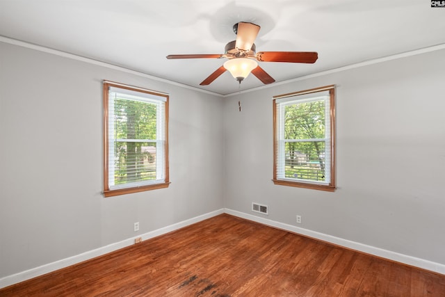 811 Rosedale Rd, West Columbia, SC 29170 - spare room with healthy amount of natural light, wood finished floors, ornamental molding, and a ceiling fan