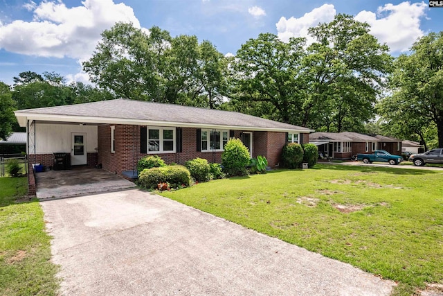 811 Rosedale Rd, West Columbia, SC 29170 - single story home featuring brick siding, concrete driveway, a front yard, and an attached carport