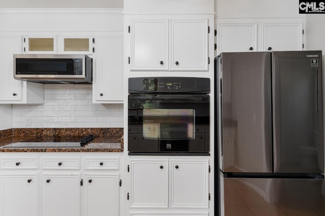 800 Valhalla Dr, Columbia, SC 29229 - kitchen featuring black appliances, white cabinetry, tasteful backsplash, and dark stone counters