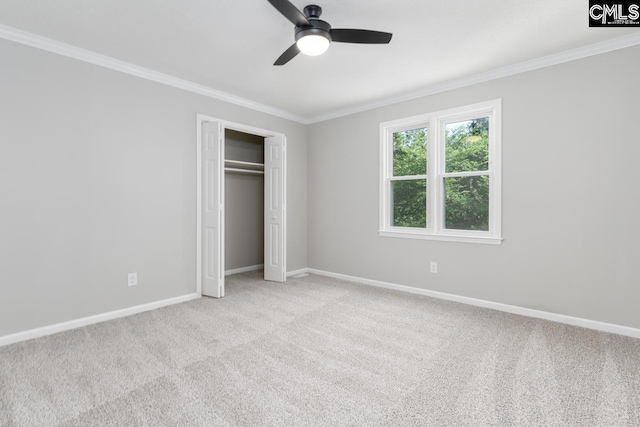 800 Valhalla Dr, Columbia, SC 29229 - unfurnished bedroom featuring ornamental molding, light colored carpet, a closet, and a ceiling fan