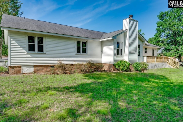 800 Valhalla Dr, Columbia, SC 29229 - back of property featuring a deck, a chimney, a lawn, crawl space, and roof with shingles