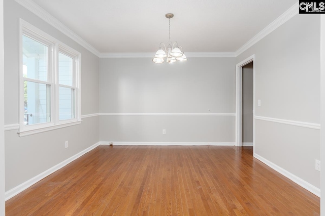 800 Valhalla Dr, Columbia, SC 29229 - empty room with a chandelier, light wood-type flooring, and ornamental molding