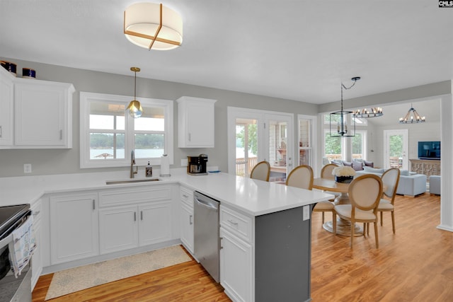 116 Laurel Rock Pt, Leesville, SC 29070 - kitchen featuring stainless steel appliances, a peninsula, healthy amount of natural light, and open floor plan