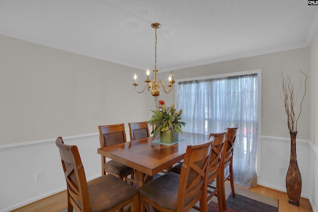 316 Founders Ridge Rd, Columbia, SC 29229 - dining space featuring a chandelier, wood finished floors, and crown molding