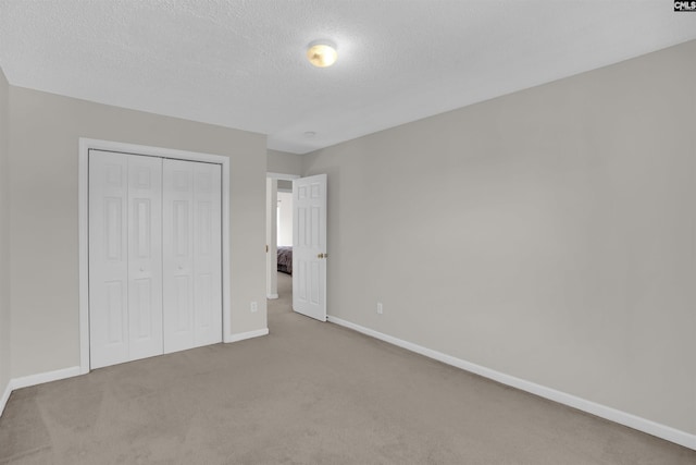 316 Founders Ridge Rd, Columbia, SC 29229 - unfurnished bedroom with carpet, a textured ceiling, and a closet