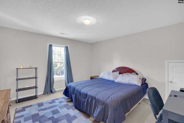 316 Founders Ridge Rd, Columbia, SC 29229 - carpeted bedroom featuring a textured ceiling and baseboards