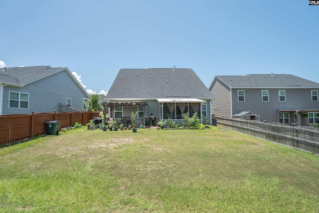 532 Ariel Cir, Lexington, SC 29072 - rear view of house with a fenced backyard and a sunroom