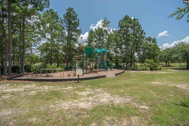 532 Ariel Cir, Lexington, SC 29072 - communal playground featuring a lawn and view of wooded area