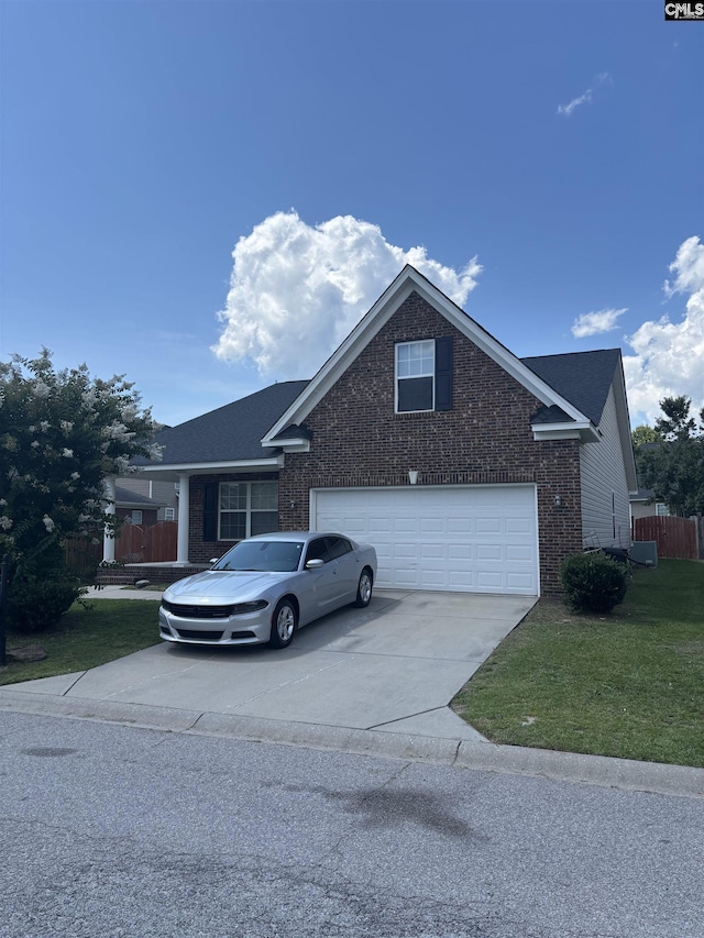 117 Parkstone Way W, Columbia, SC 29170 - view of front of house featuring brick siding, driveway, and a garage