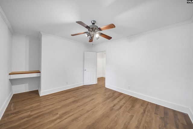 1005 D Ave, West Columbia, SC 29169 - empty room with ornamental molding, ceiling fan, and wood finished floors