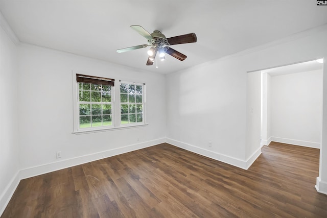 1005 D Ave, West Columbia, SC 29169 - empty room featuring dark wood-style flooring, a ceiling fan, and ornamental molding