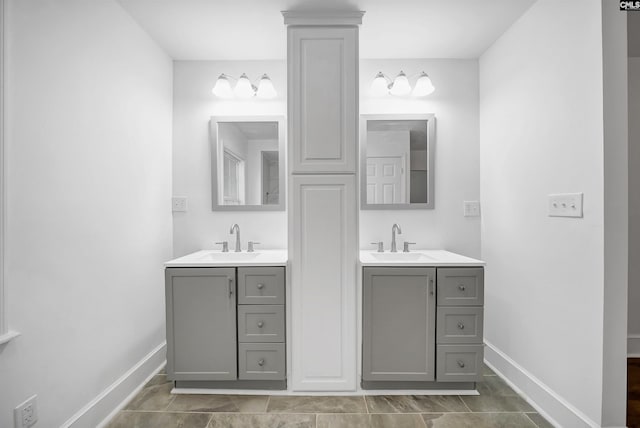 1005 D Ave, West Columbia, SC 29169 - bathroom featuring two vanities and baseboards