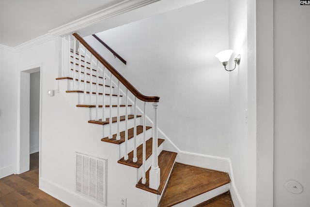 1005 D Ave, West Columbia, SC 29169 - stairs featuring wood finished floors and crown molding