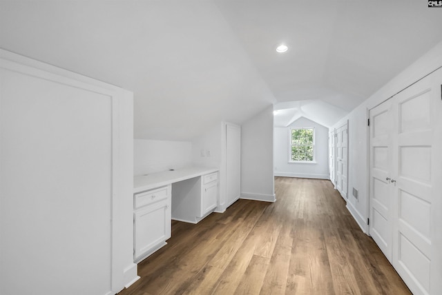 1005 D Ave, West Columbia, SC 29169 - additional living space featuring built in study area, lofted ceiling, wood finished floors, and recessed lighting