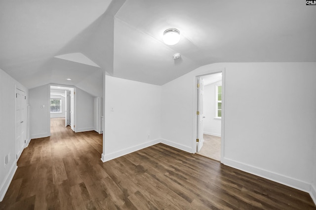 1005 D Ave, West Columbia, SC 29169 - additional living space featuring vaulted ceiling and dark wood-type flooring