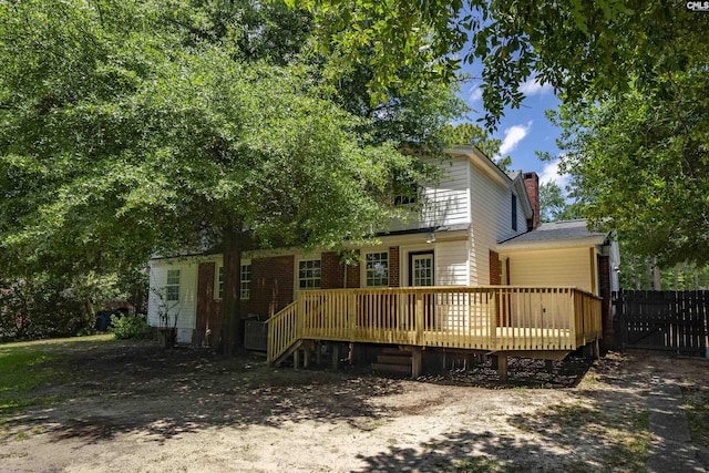 1005 D Ave, West Columbia, SC 29169 - rear view of property featuring a chimney and a wooden deck