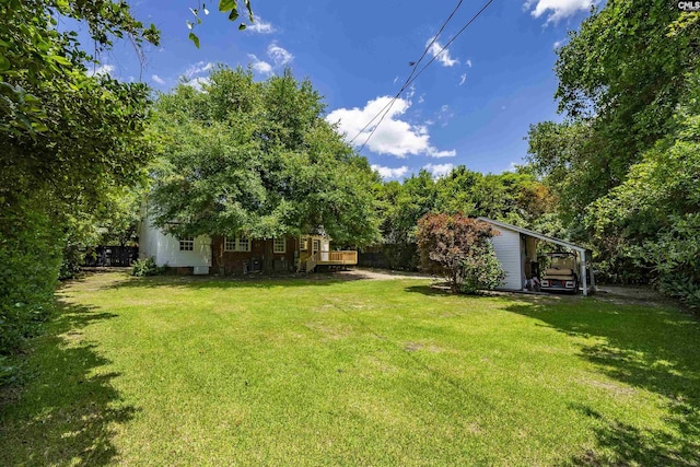 1005 D Ave, West Columbia, SC 29169 - view of green lawn with a wooden deck