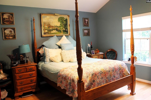 499 Woodhouse Loop, Irmo, SC 29063 - bedroom featuring wood finished floors and vaulted ceiling