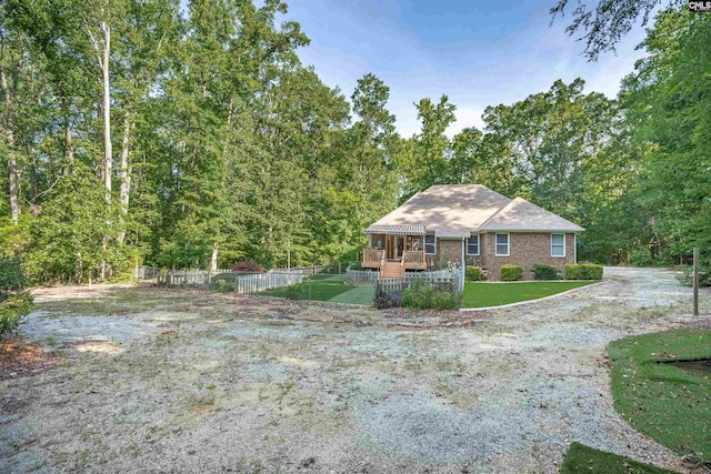 1176 Whippoorwill Rd, Prosperity, SC 29127 - view of front of property with a deck and a wooded view
