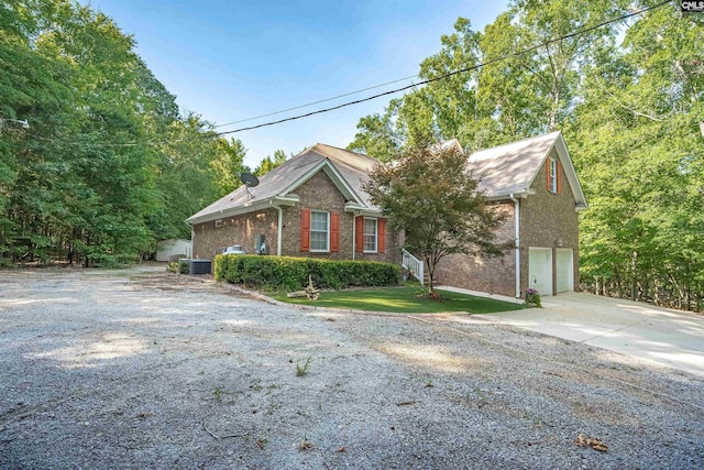 1176 Whippoorwill Rd, Prosperity, SC 29127 - view of front facade with concrete driveway, brick siding, and a garage