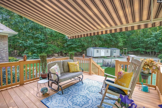 1176 Whippoorwill Rd, Prosperity, SC 29127 - wooden terrace featuring a shed and an outdoor living space