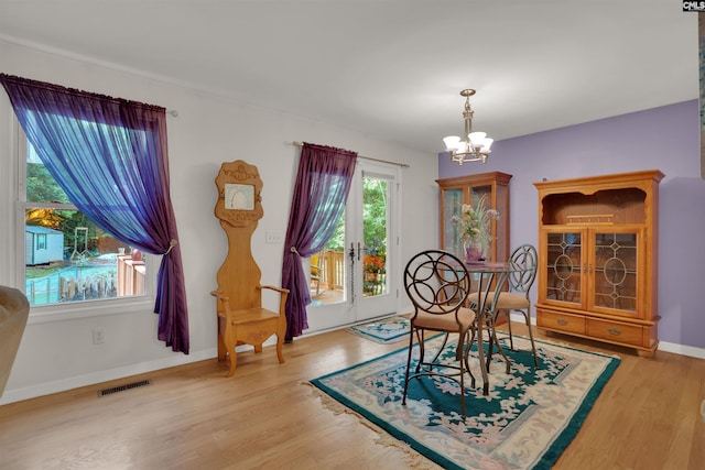 1176 Whippoorwill Rd, Prosperity, SC 29127 - dining area featuring a chandelier and wood finished floors