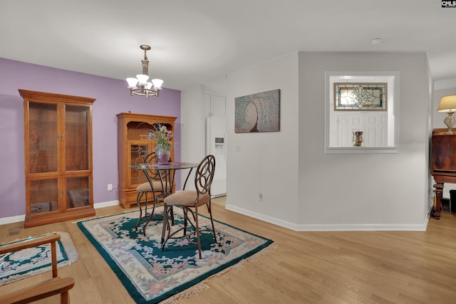 1176 Whippoorwill Rd, Prosperity, SC 29127 - living area with wood finished floors and a chandelier
