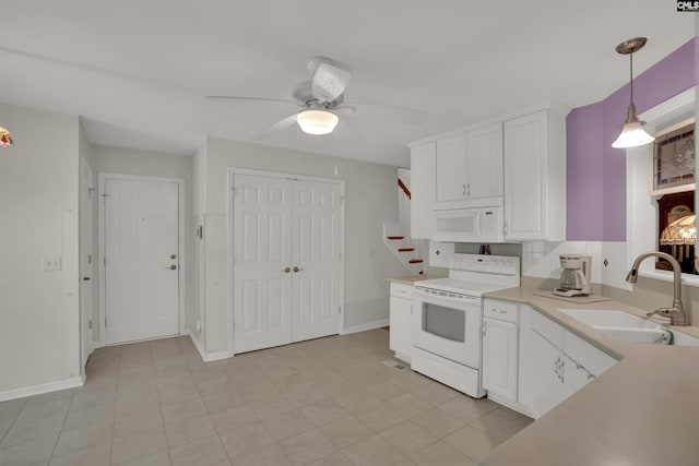 1176 Whippoorwill Rd, Prosperity, SC 29127 - kitchen with white appliances, a ceiling fan, white cabinetry, light countertops, and decorative light fixtures