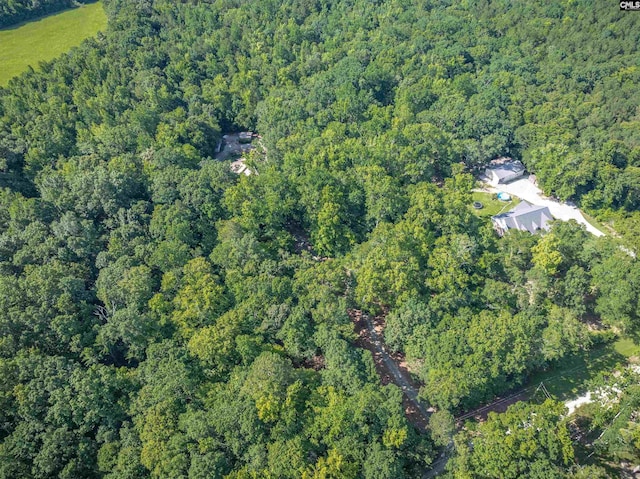 1176 Whippoorwill Rd, Prosperity, SC 29127 - aerial view of property and surrounding area featuring a heavily wooded area