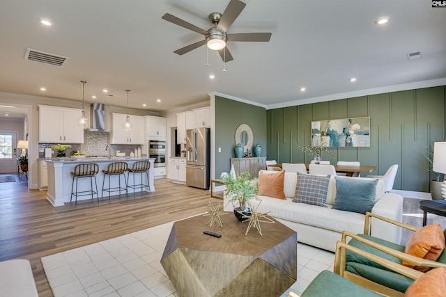 821 Oak Valley Dr, Blythewood, SC 29016 - living area featuring ornamental molding, ceiling fan, light wood-style floors, and recessed lighting