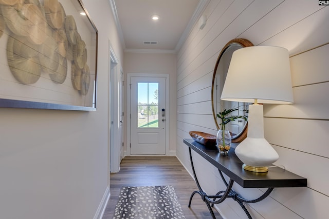 821 Oak Valley Dr, Blythewood, SC 29016 - entryway featuring ornamental molding, wood finished floors, wood walls, and recessed lighting