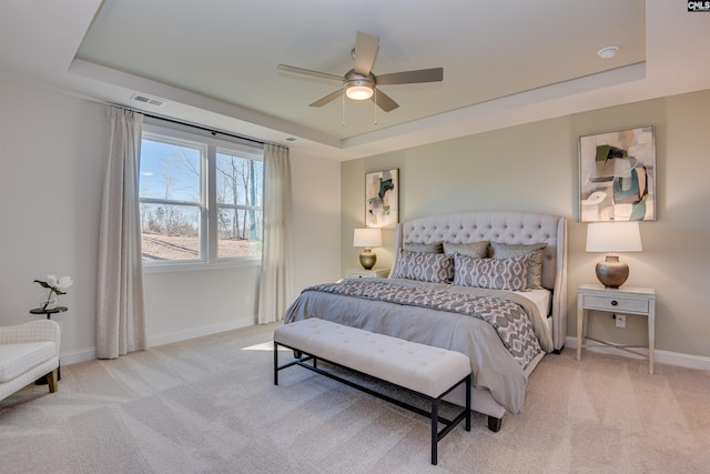 821 Oak Valley Dr, Blythewood, SC 29016 - bedroom with a tray ceiling, carpet flooring, and ceiling fan