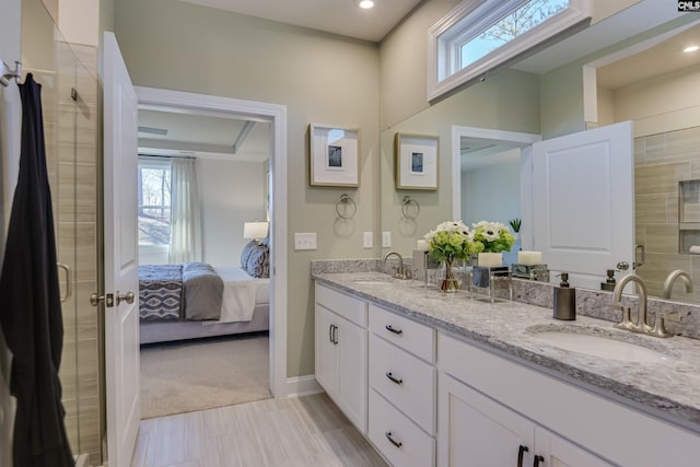 821 Oak Valley Dr, Blythewood, SC 29016 - ensuite bathroom with double vanity, healthy amount of natural light, a shower stall, and recessed lighting