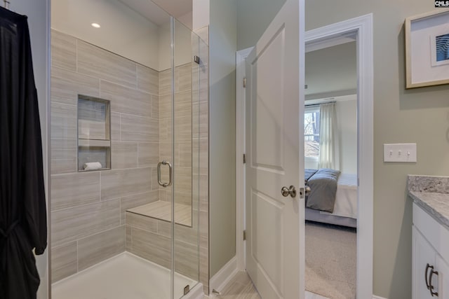821 Oak Valley Dr, Blythewood, SC 29016 - bathroom with vanity, a stall shower, and ensuite bath