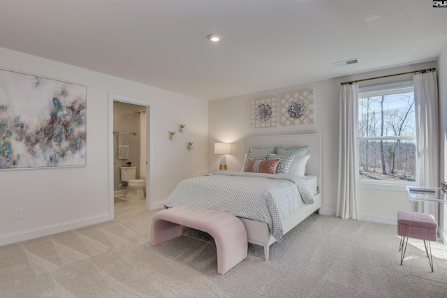 821 Oak Valley Dr, Blythewood, SC 29016 - bedroom with light colored carpet and ensuite bathroom