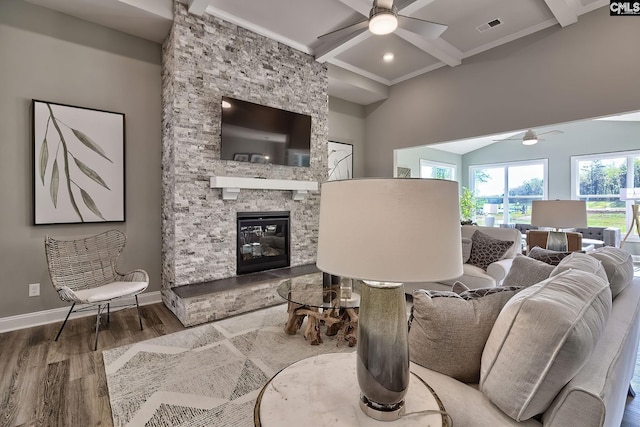793 Oak Valley Dr, Blythewood, SC 29016 - living room featuring a ceiling fan, wood finished floors, a fireplace, beamed ceiling, and coffered ceiling