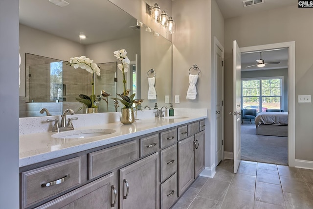 793 Oak Valley Dr, Blythewood, SC 29016 - ensuite bathroom with double vanity, ceiling fan, and tile patterned flooring