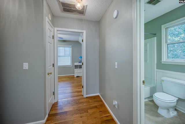 111 Double Branch Ct, West Columbia, SC 29169 - hall with a textured ceiling and wood finished floors