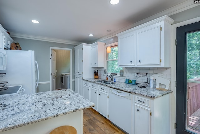 111 Double Branch Ct, West Columbia, SC 29169 - kitchen featuring white appliances, crown molding, backsplash, dark wood-style floors, and white cabinets
