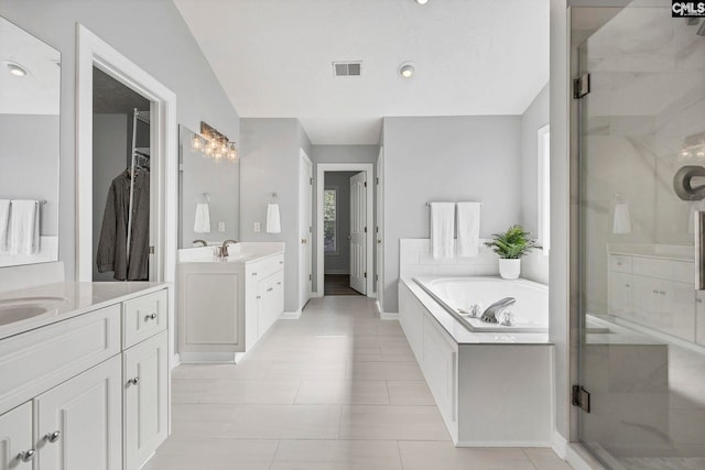 113 Chalfont Ln, Columbia, SC 29229 - full bathroom with a shower stall, two vanities, a garden tub, and lofted ceiling