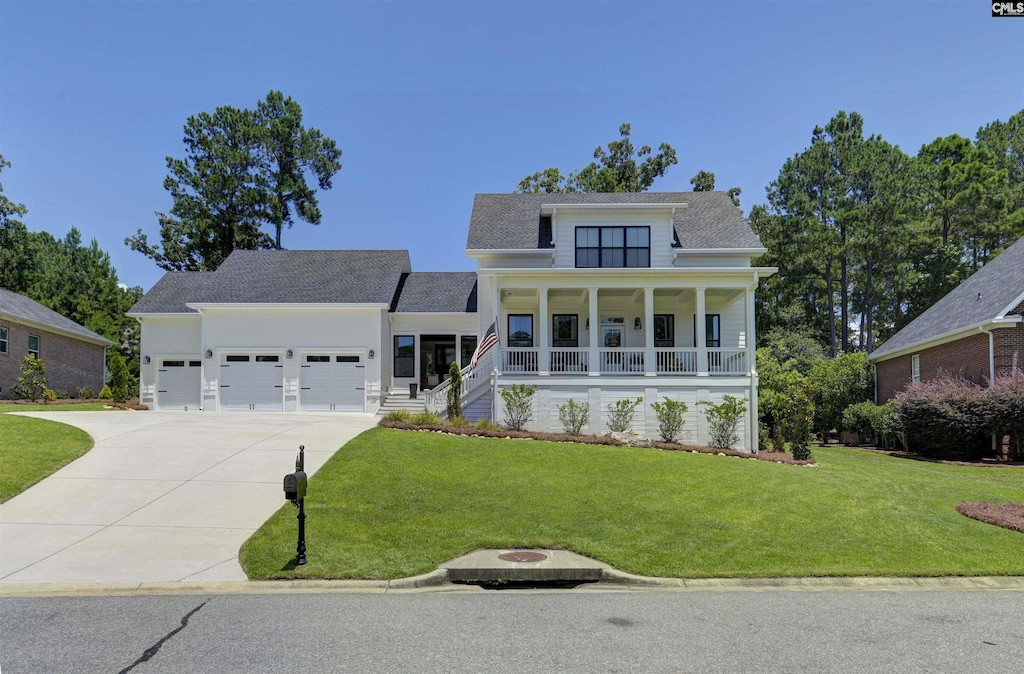 133 Summer Breeze Dr, Leesville, SC 29070 - view of front of property with concrete driveway, an attached garage, covered porch, a front lawn, and roof with shingles