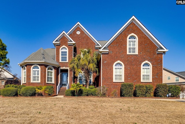 340 Heritage Forest Dr, Blythewood, SC 29045 - traditional home featuring brick siding and a front lawn