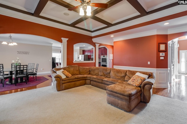 340 Heritage Forest Dr, Blythewood, SC 29045 - living area with arched walkways, decorative columns, ornamental molding, a ceiling fan, and carpet floors