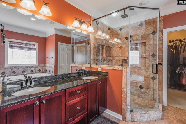 340 Heritage Forest Dr, Blythewood, SC 29045 - full bathroom featuring ornamental molding, a bath, a shower stall, double vanity, and a walk in closet