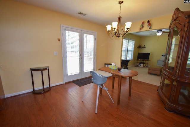 458 Laurel Mist Ln, West Columbia, SC 29170 - dining space featuring french doors, wood finished floors, a chandelier, and ceiling fan