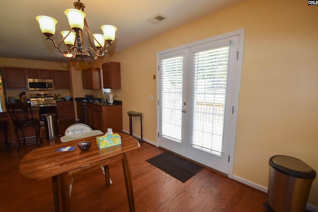 458 Laurel Mist Ln, West Columbia, SC 29170 - dining room featuring french doors, wood finished floors, and a chandelier